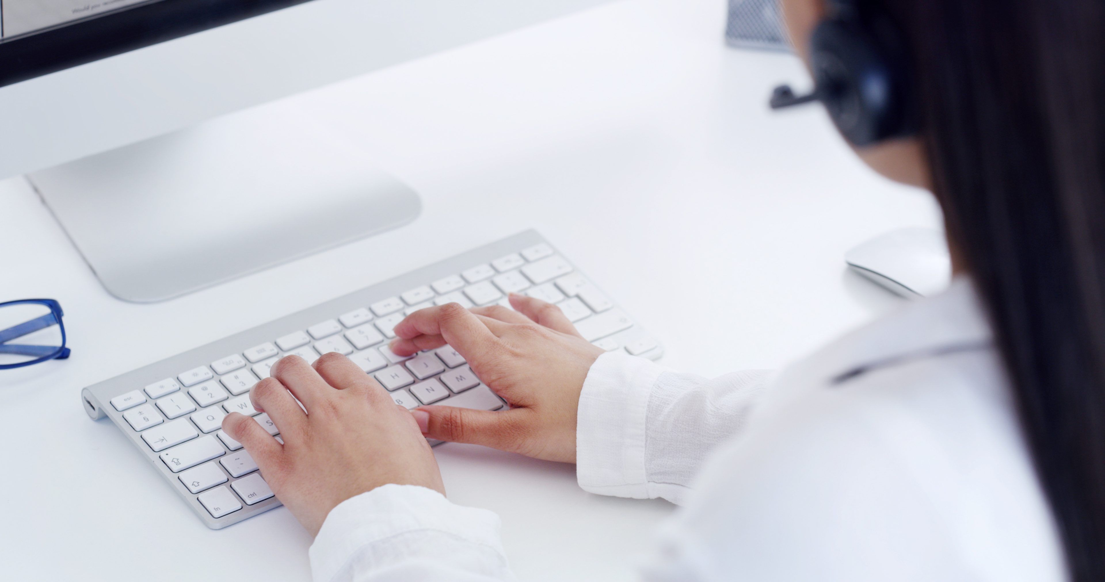 Hands, call center and woman typing on keyboard for customer service, software feedback or help desk. Person, hotline and agent with computer for IT support, virtual communication or email response.